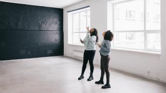 women looking up in an office